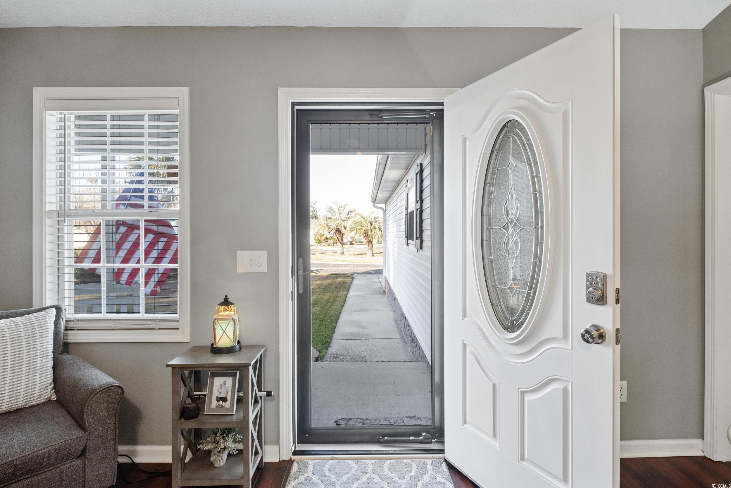 9605 Sullivan Drive Murrells Inlet, SC 29576 - Photo 9 of 40 Entryway featuring dark wood-type flooring