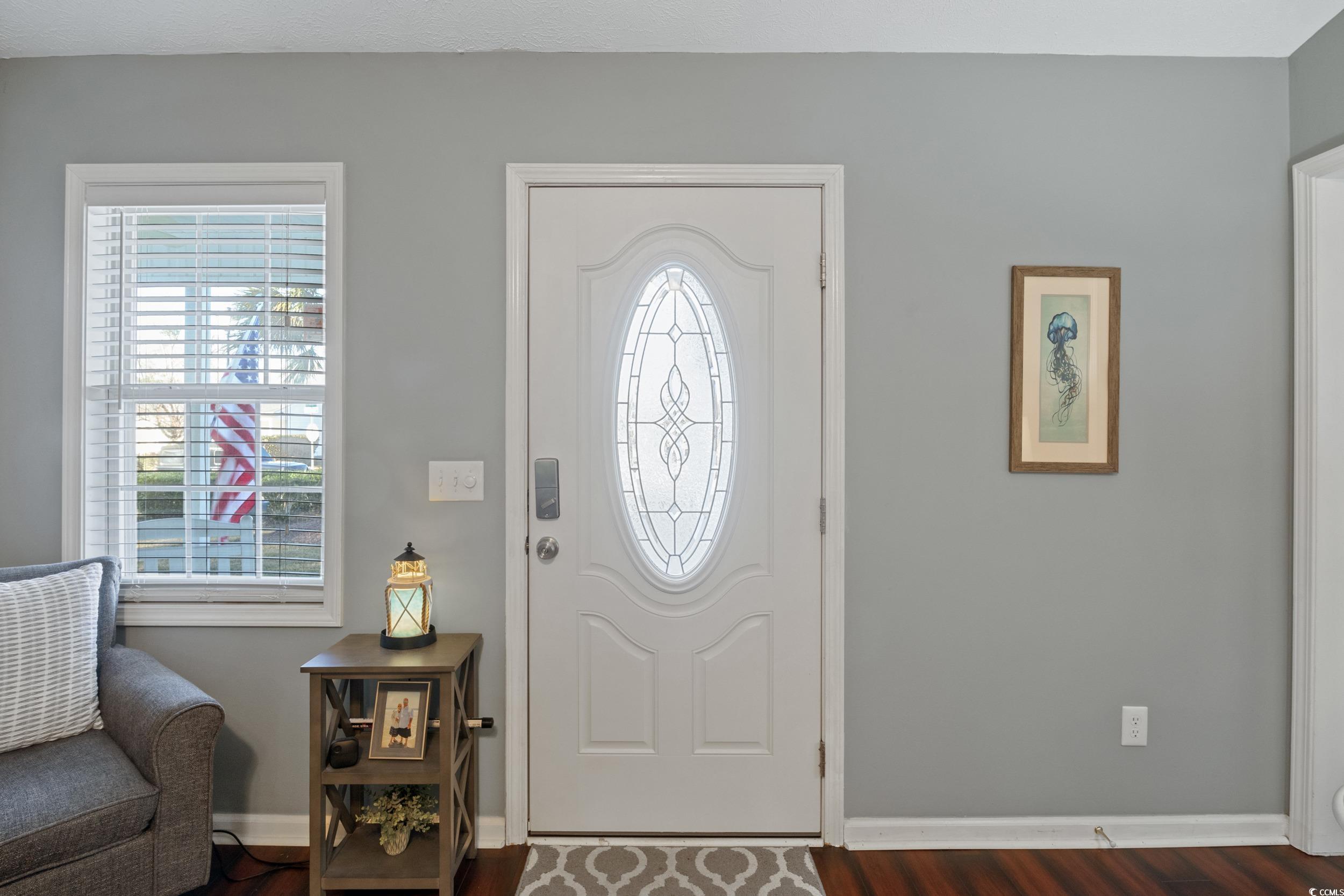 9605 Sullivan Drive Murrells Inlet, SC 29576 - Photo 10 of 40 Entrance foyer with dark wood-type flooring