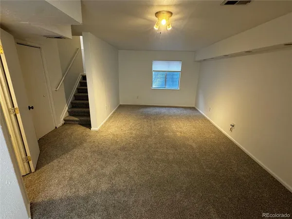 a view of a room with racks on the wall