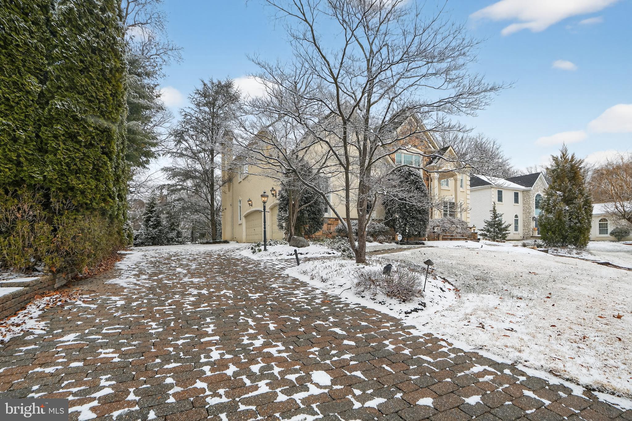 35 Stanwyck Road Mount Laurel, NJ 08054 - Photo 12 of 89 a front view of a house with a yard covered in snow