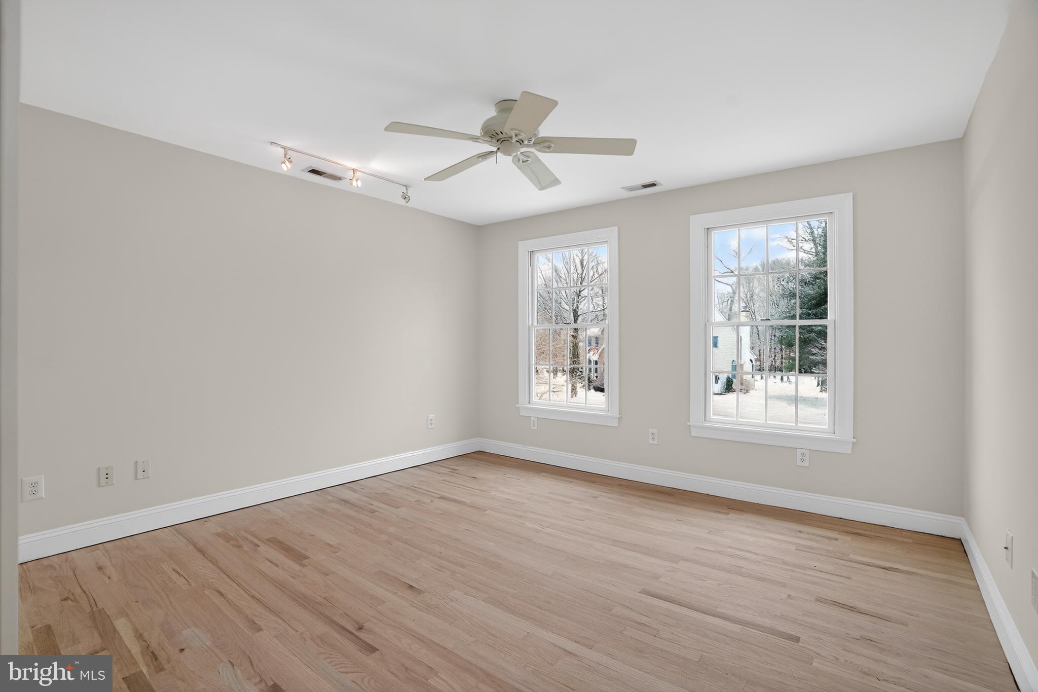 35 Stanwyck Road Mount Laurel, NJ 08054 - Photo 36 of 89 a view of an empty room with wooden floor and a window