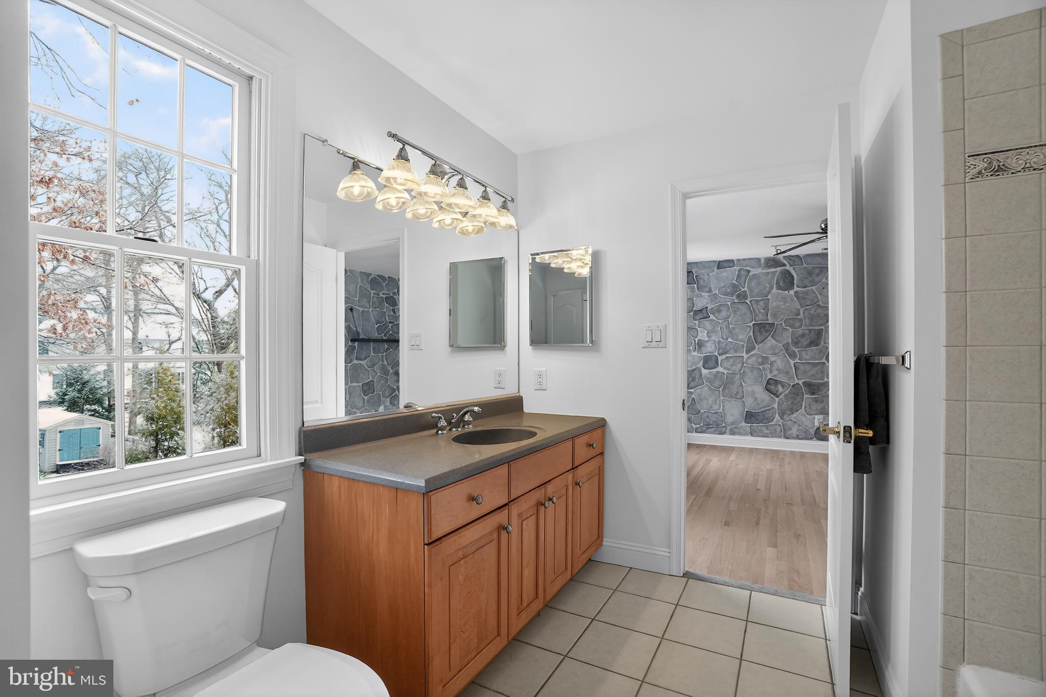 35 Stanwyck Road Mount Laurel, NJ 08054 - Photo 41 of 89 a bathroom with a granite countertop sink a toilet a mirror and a tub
