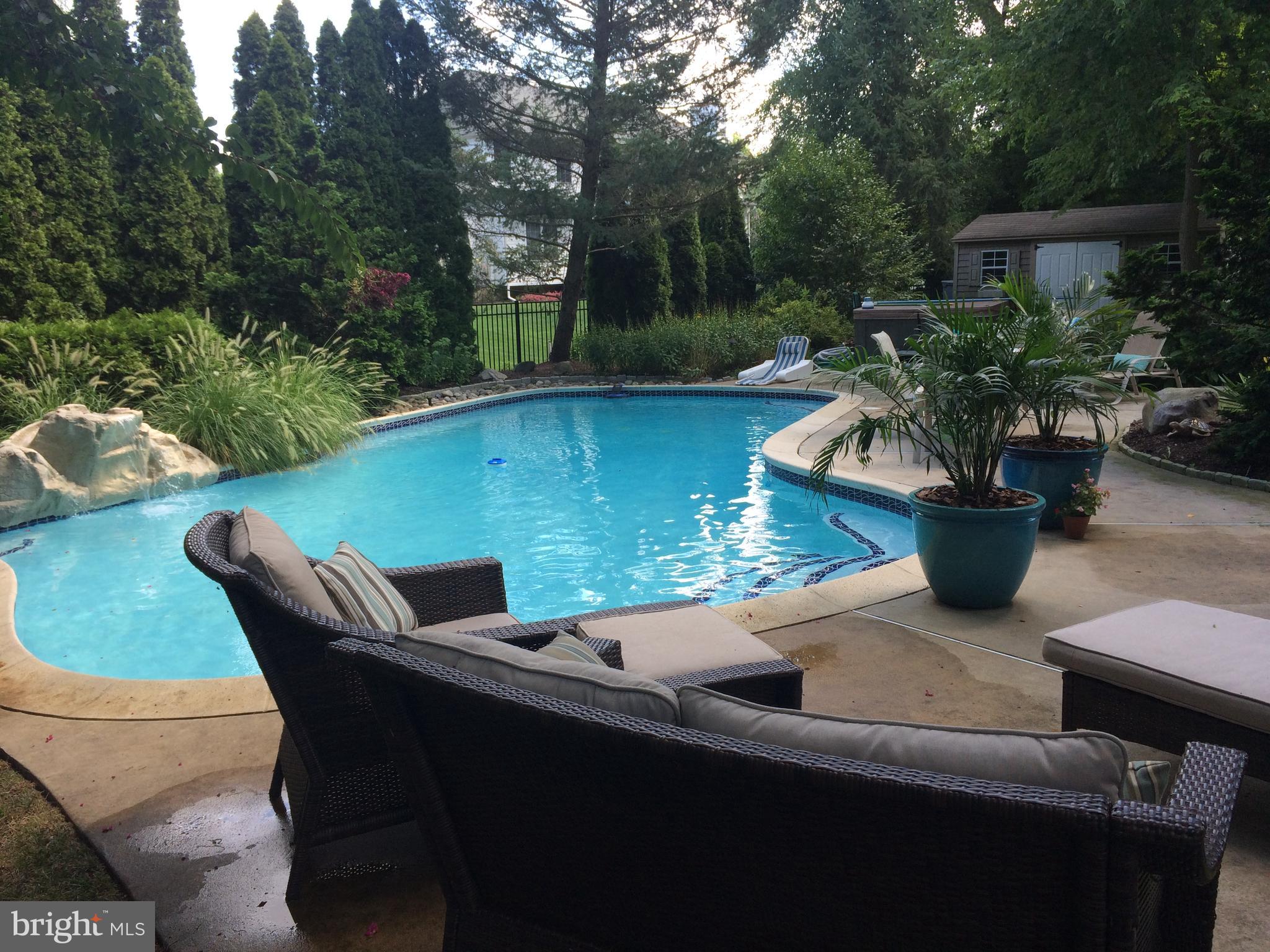 35 Stanwyck Road Mount Laurel, NJ 08054 - Photo 62 of 89 a view of a backyard with sitting area and garden