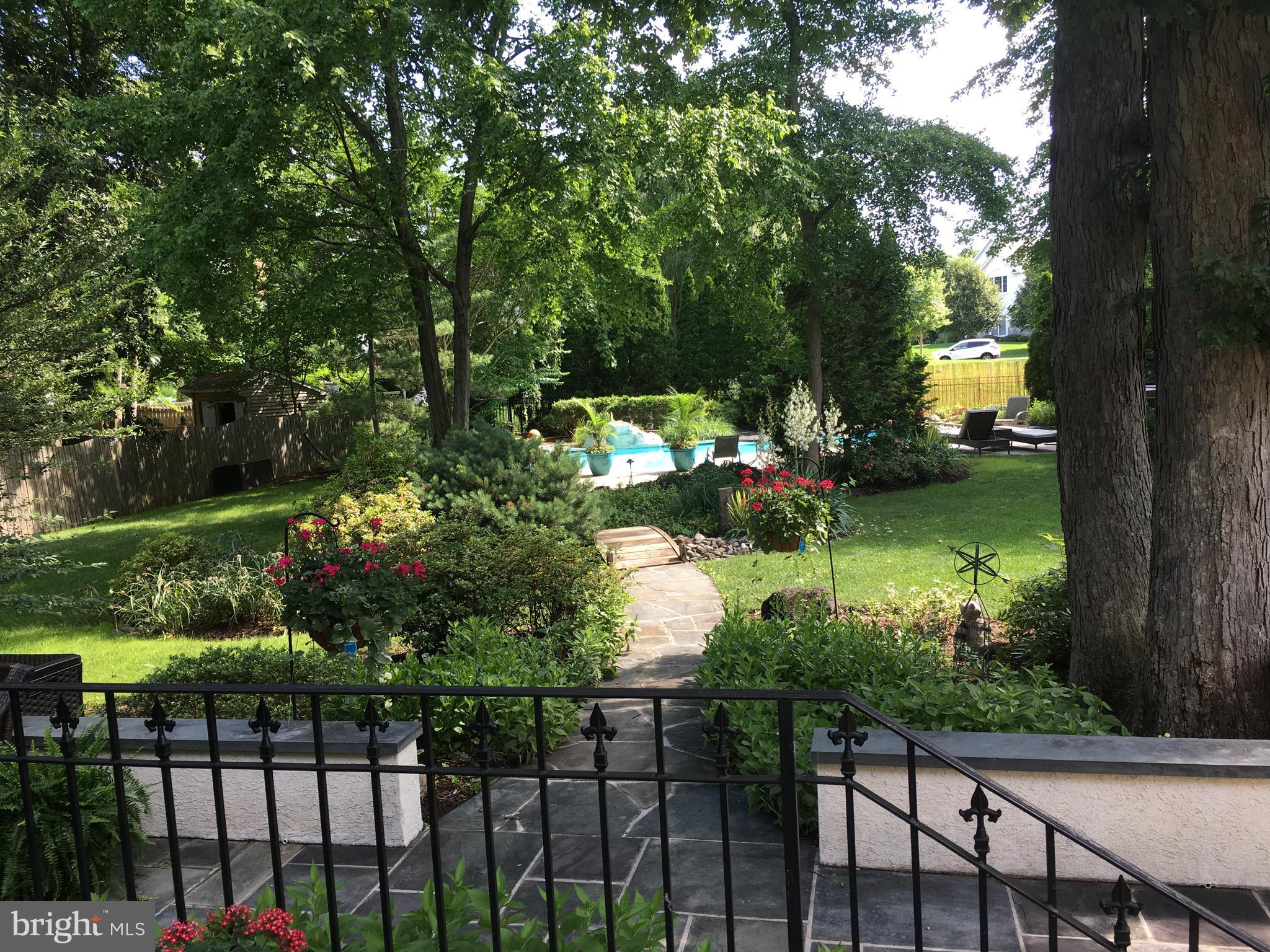 35 Stanwyck Road Mount Laurel, NJ 08054 - Photo 81 of 89 a view of a lake from a garden