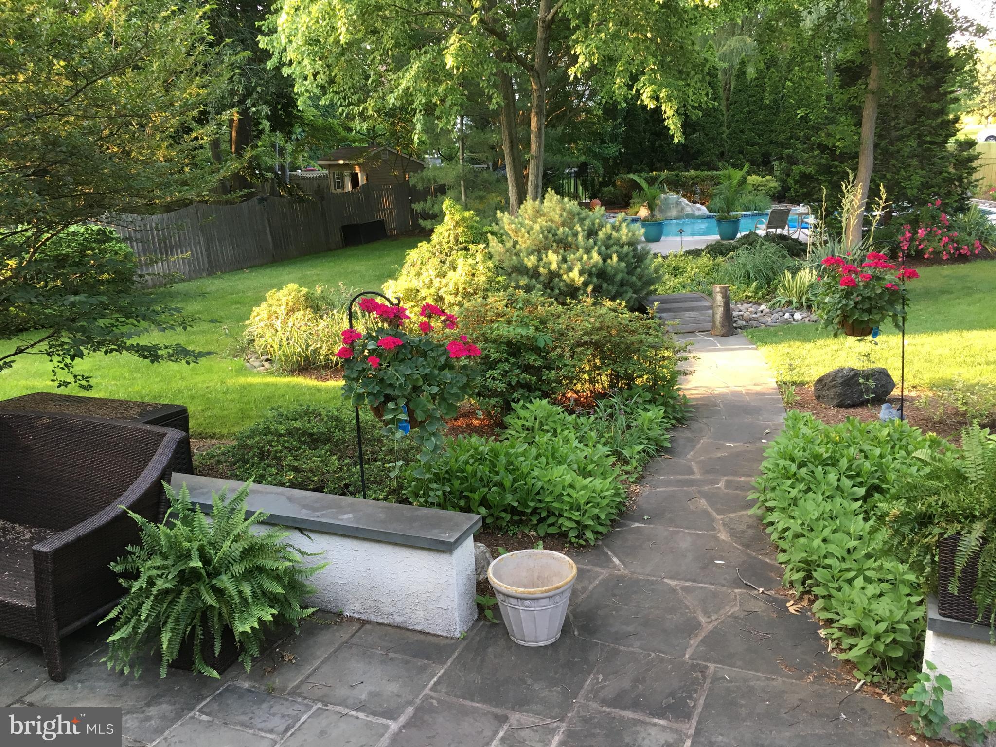 35 Stanwyck Road Mount Laurel, NJ 08054 - Photo 84 of 89 a view of a garden with flowers and large trees