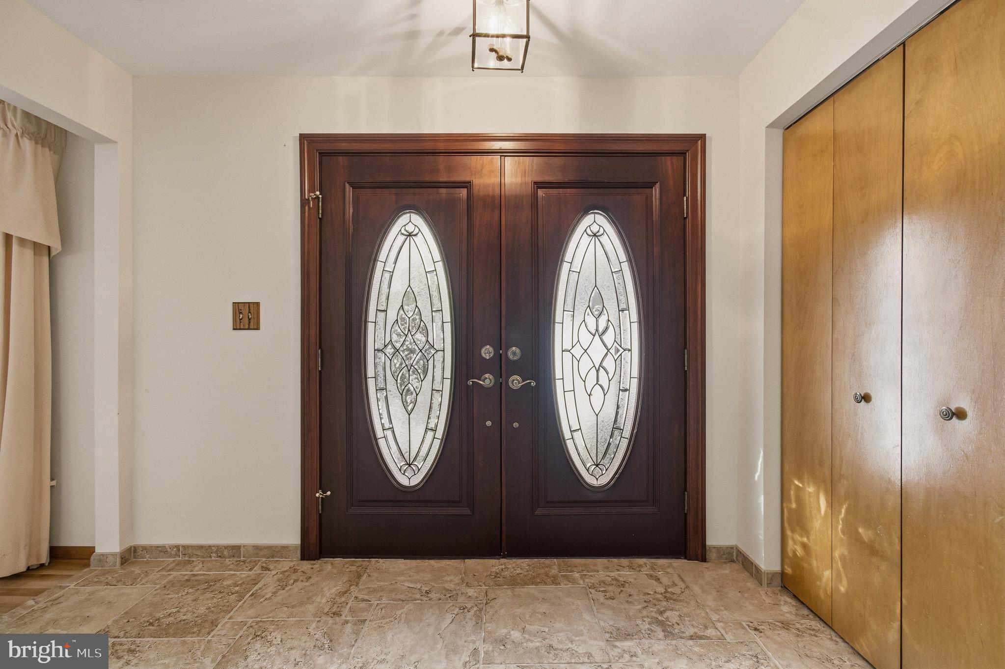 1290 Whirl A Way Court Gambrills, MD 21054 - Photo 17 of 111 a view of door with washer and dryer