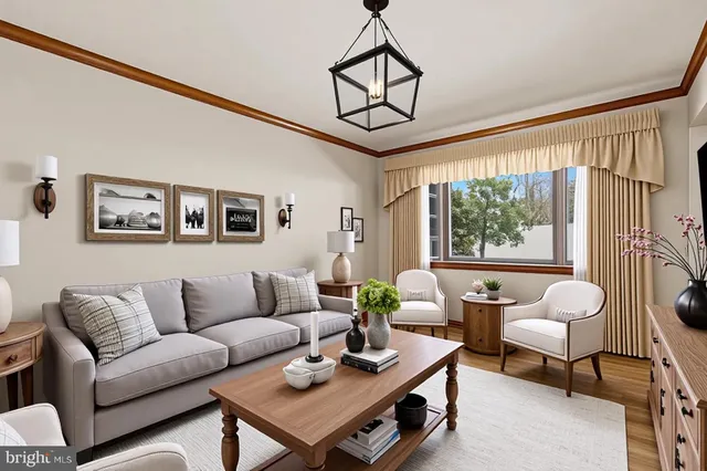 a kitchen with a refrigerator a sink and cabinets