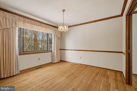 a view of a room with an entryway