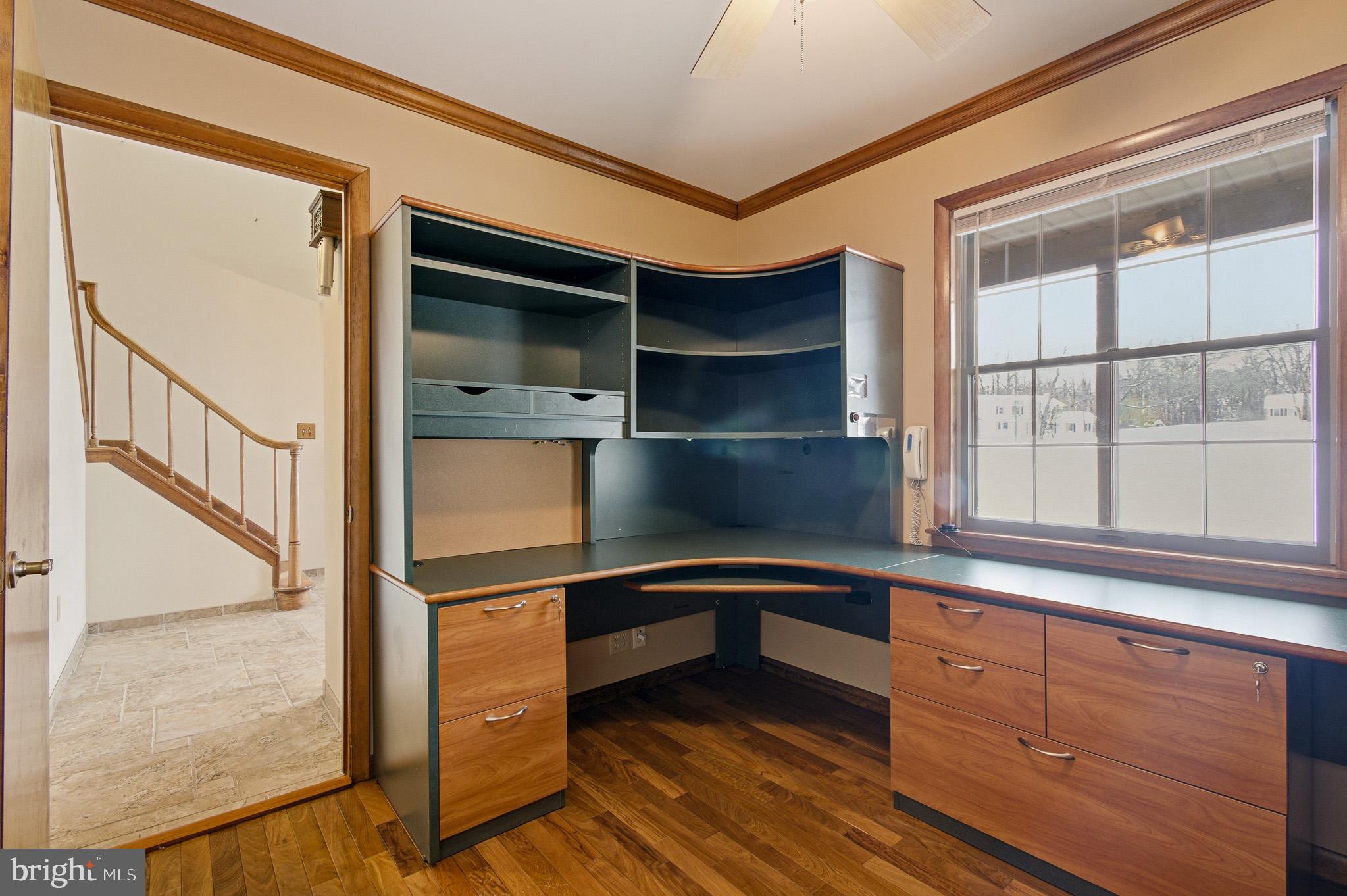 1290 Whirl A Way Court Gambrills, MD 21054 - Photo 34 of 111 a hallway view with wooden floor and windows