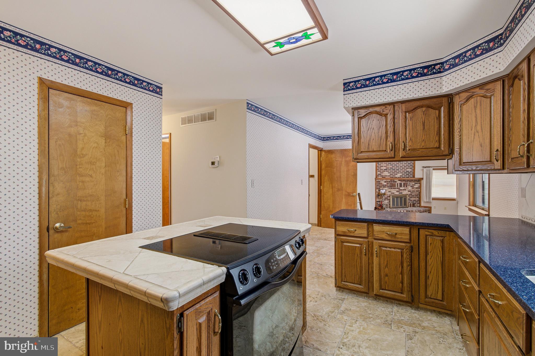 1290 Whirl A Way Court Gambrills, MD 21054 - Photo 40 of 111 a kitchen that has a sink and a stove