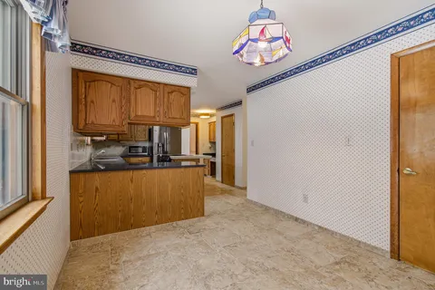 a view of balcony with two chairs