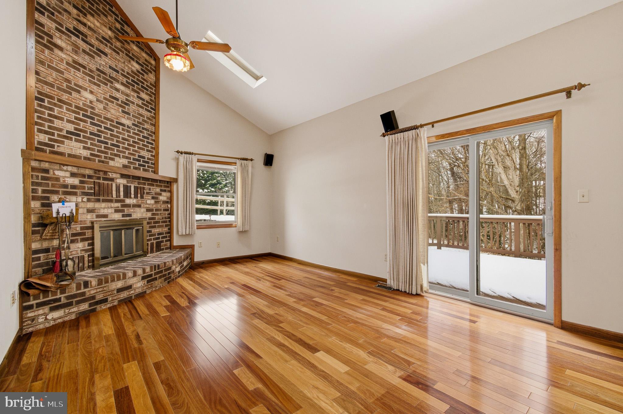1290 Whirl A Way Court Gambrills, MD 21054 - Photo 49 of 111 a view of empty room with wooden floor and fan