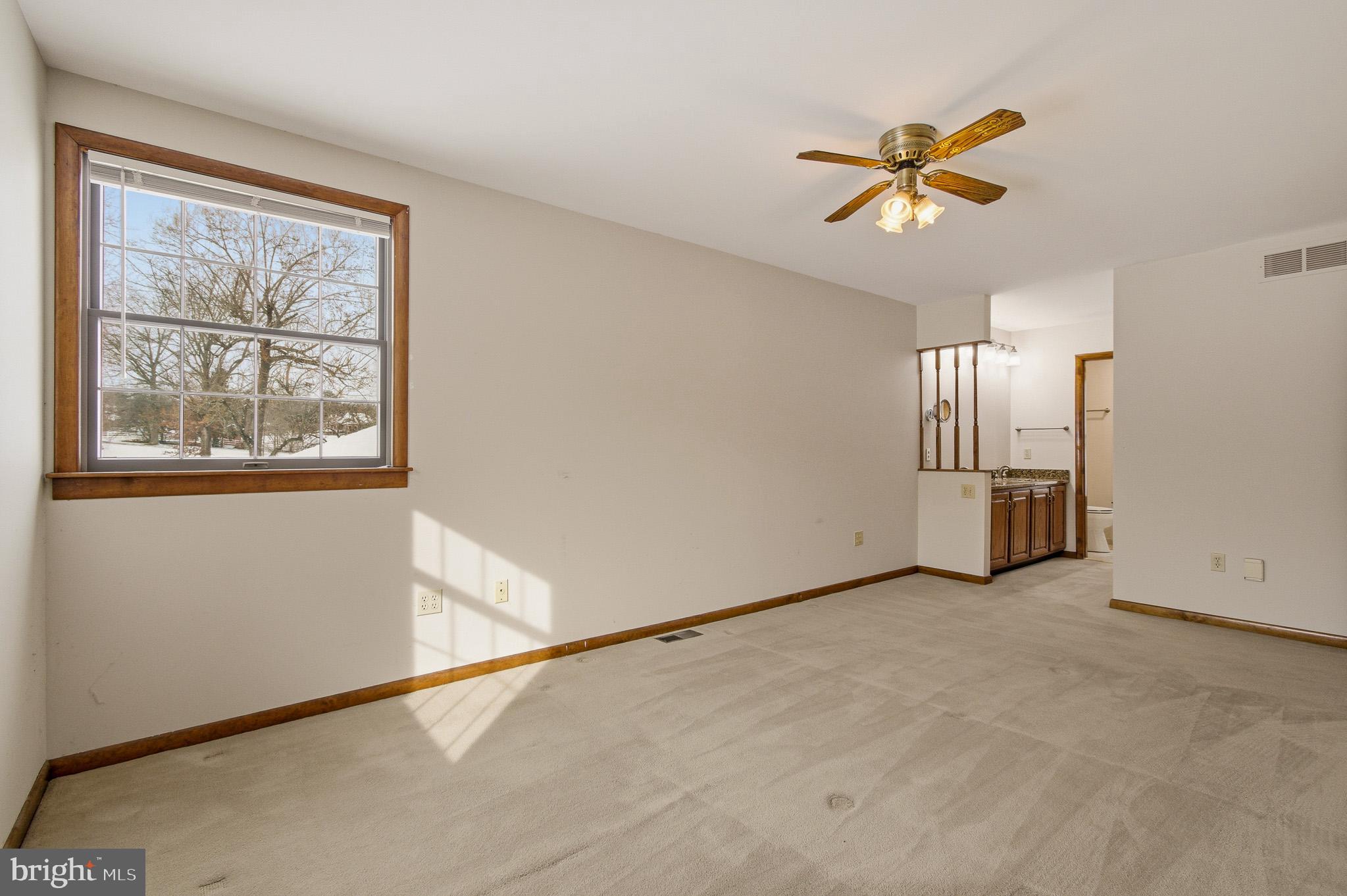 1290 Whirl A Way Court Gambrills, MD 21054 - Photo 70 of 111 a view of an empty room with a window