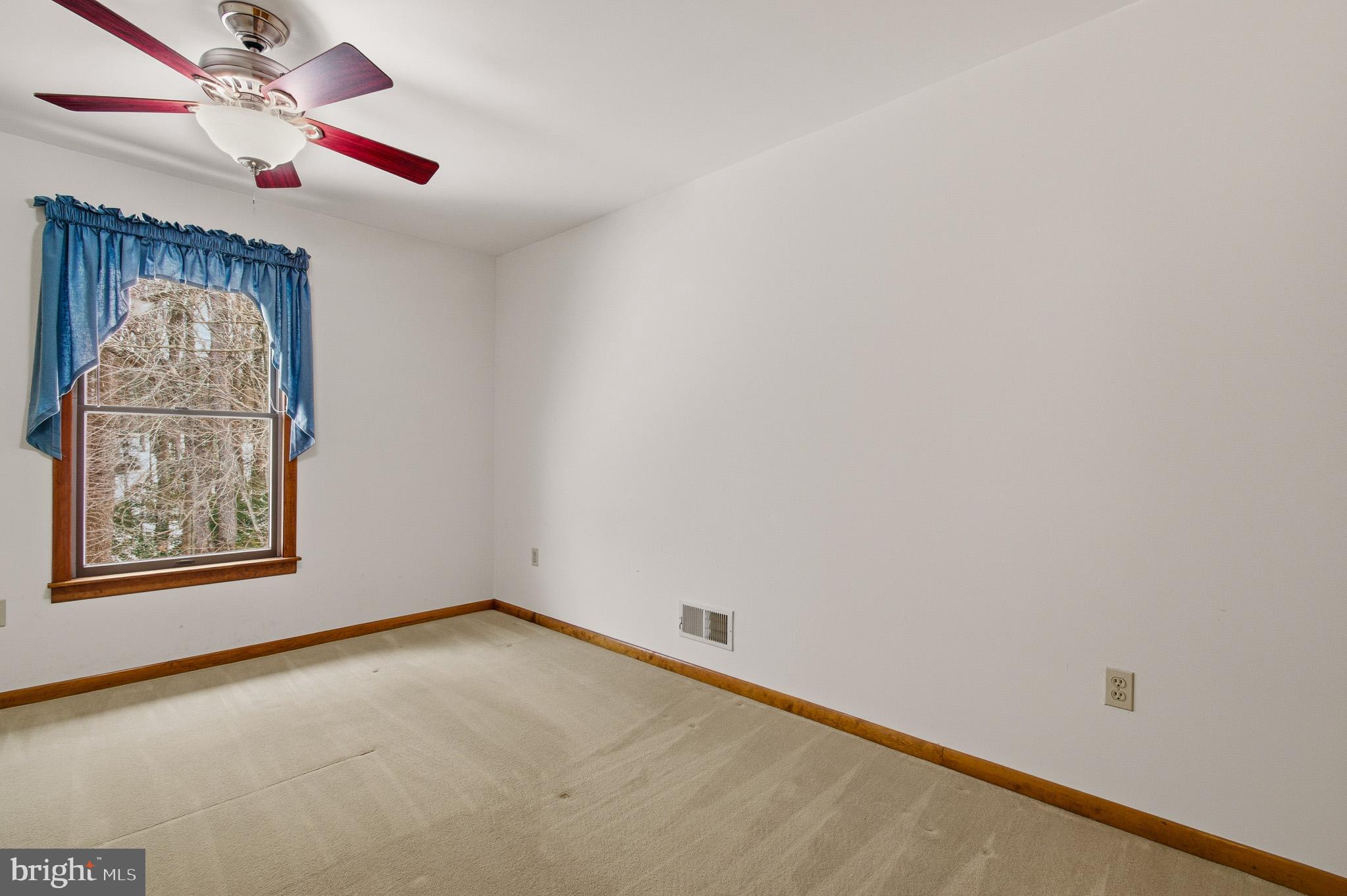 1290 Whirl A Way Court Gambrills, MD 21054 - Photo 81 of 111 an empty room with a window and a fan