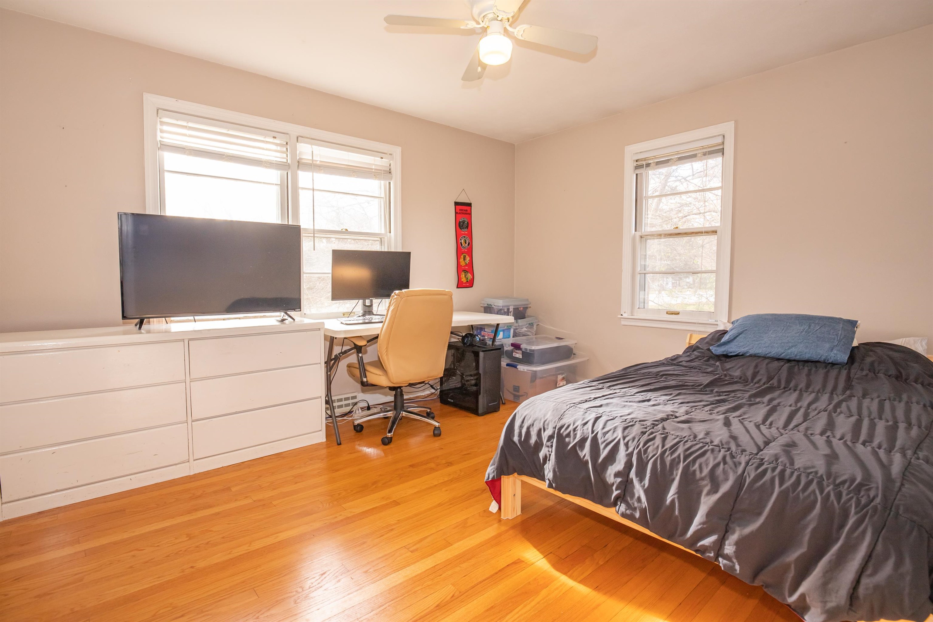 3808 Highcrest Road Rockford, IL 61107 - Photo 16 of 34 a bedroom with a bed tv and window