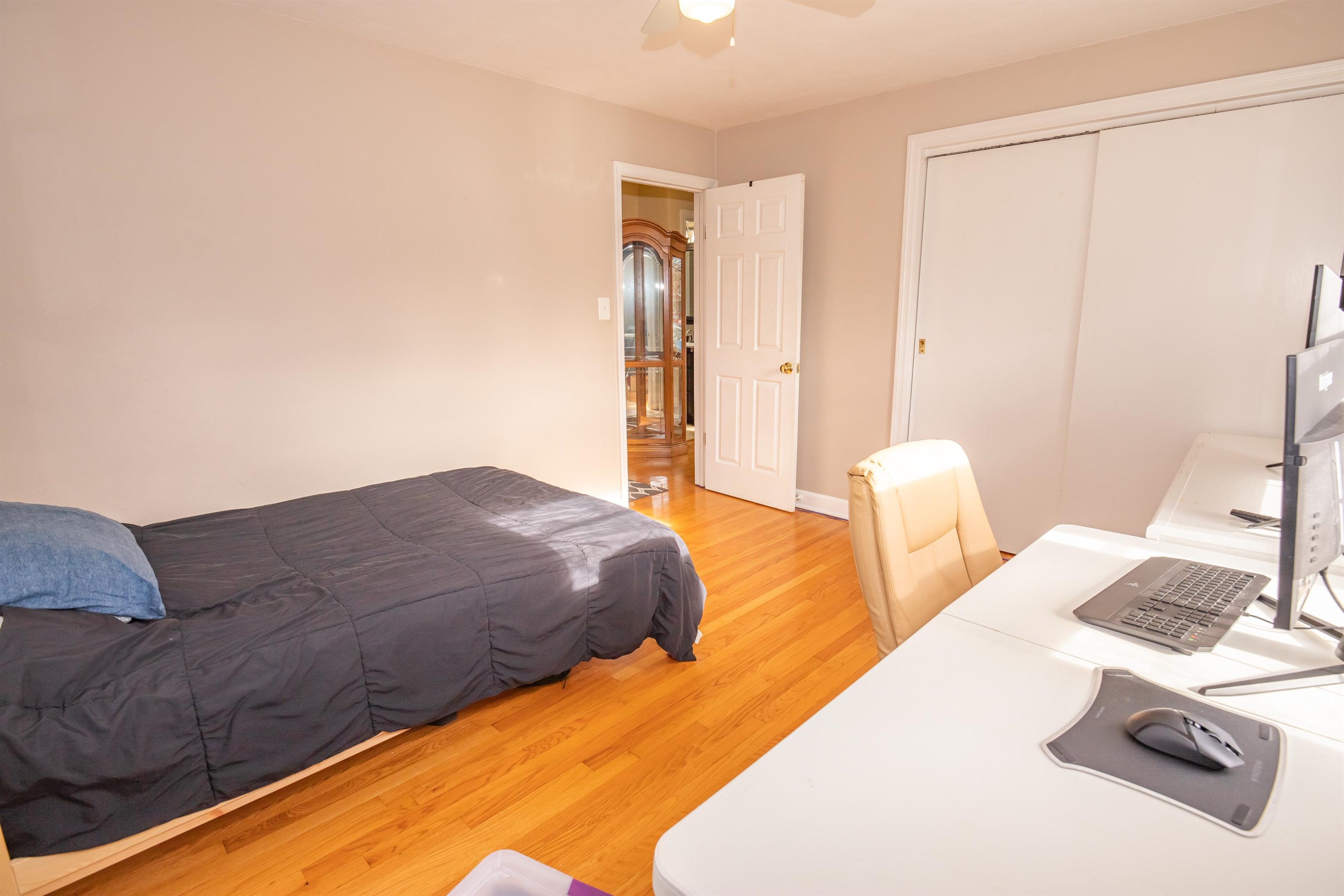 3808 Highcrest Road Rockford, IL 61107 - Photo 18 of 34 a bedroom with a bed and a table in it