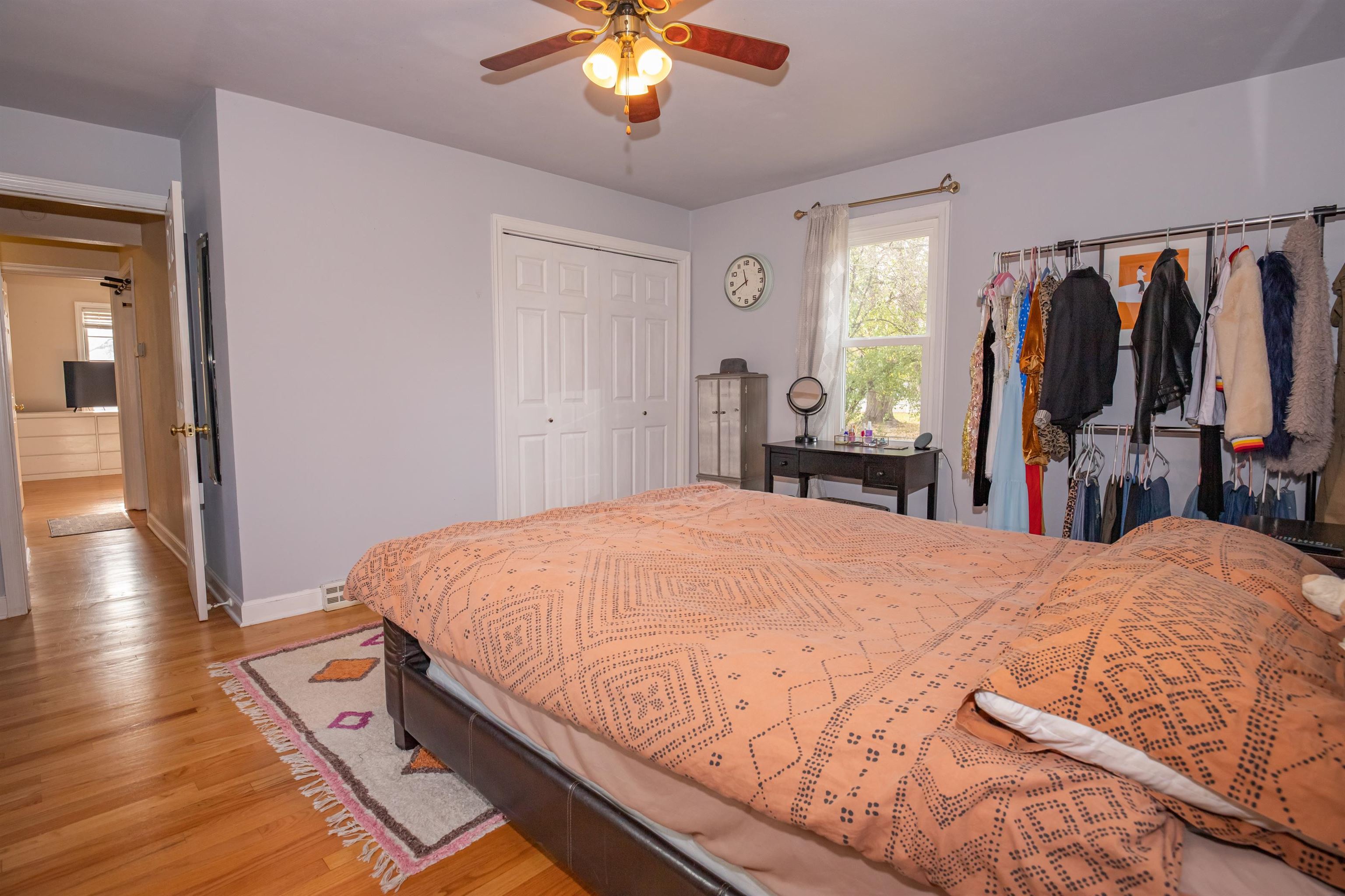 3808 Highcrest Road Rockford, IL 61107 - Photo 20 of 34 a bed sitting in a bedroom and a chandelier