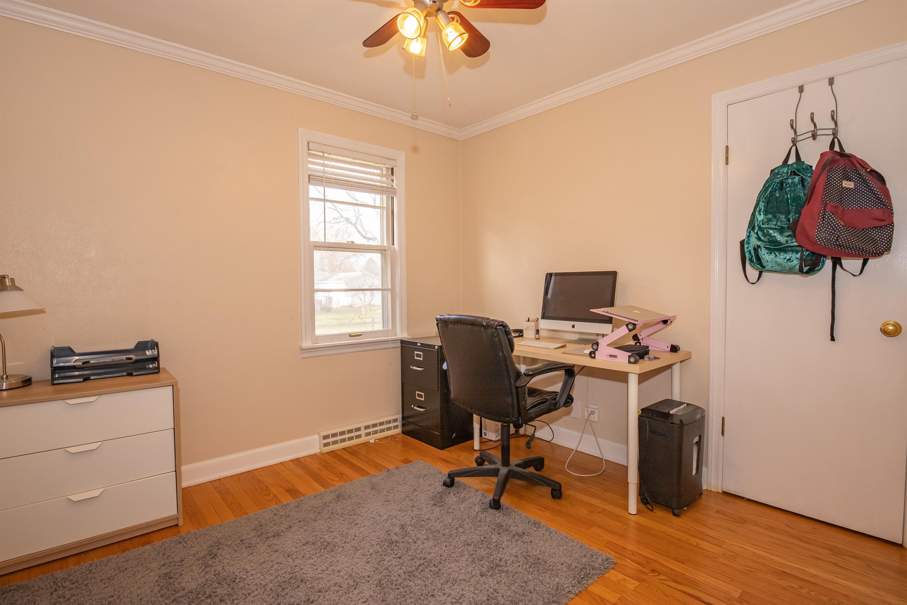 3808 Highcrest Road Rockford, IL 61107 - Photo 23 of 34 a view of a workspace with furniture and a window