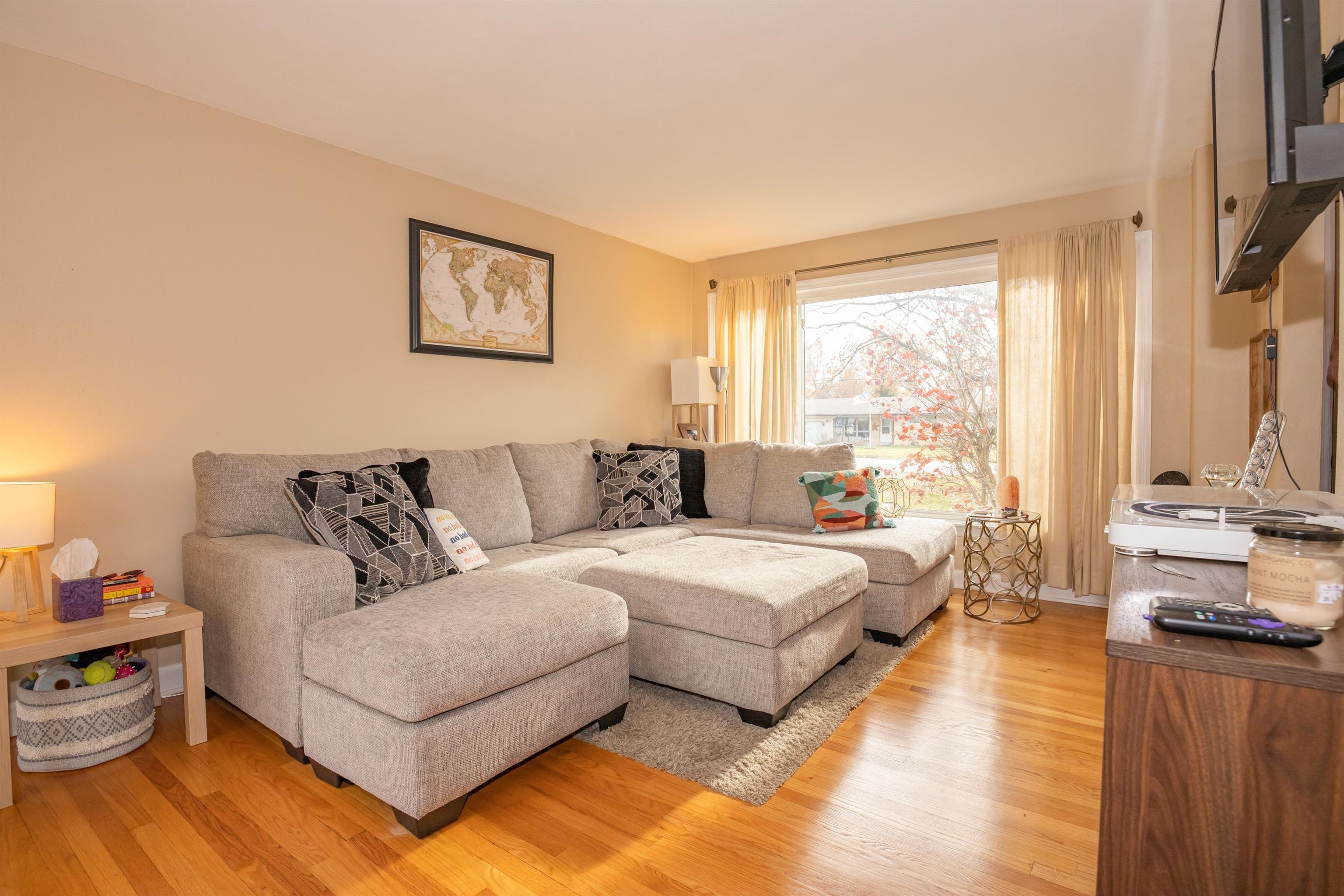 3808 Highcrest Road Rockford, IL 61107 - Photo 9 of 34 a spacious bedroom with a bed a couch and a window