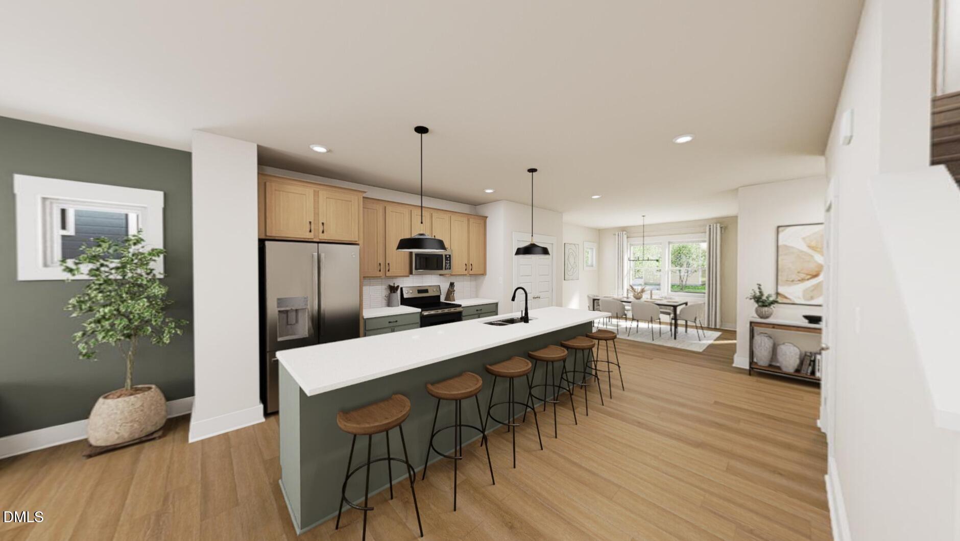 833 Central Park Drive Raleigh, NC 27604 - Photo 2 of 20 a large kitchen with a table and chairs