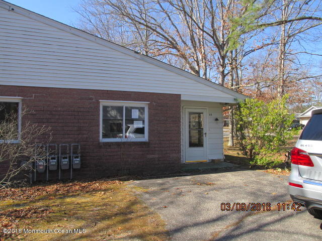 6 D Walnut Road Manahawkin, NJ 08050 - Photo 1 of 7 a backyard of a house