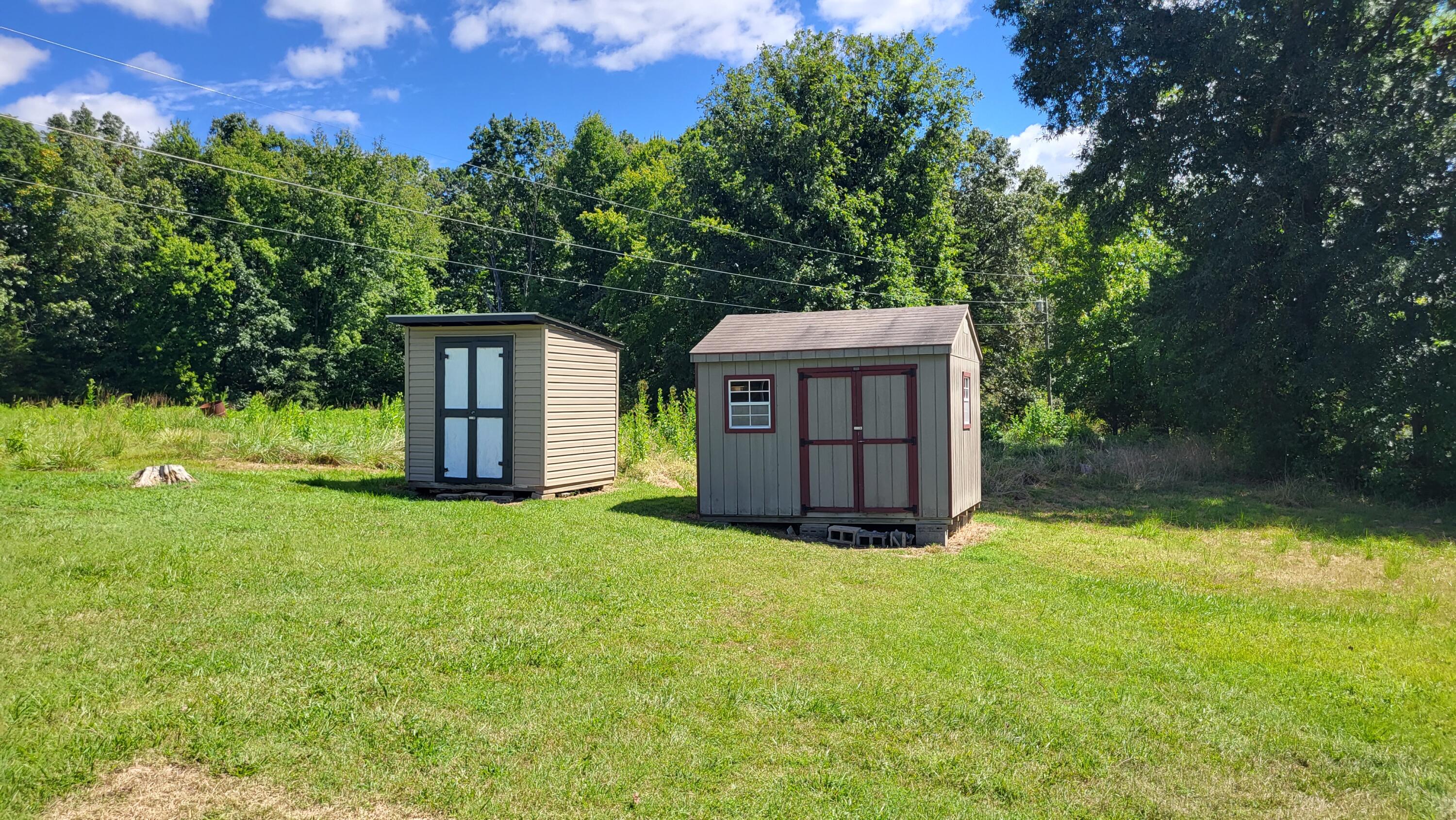 7588 Venable Road Kents Store, VA 23084 - Photo 13 of 38 a view of a house with yard and a tree