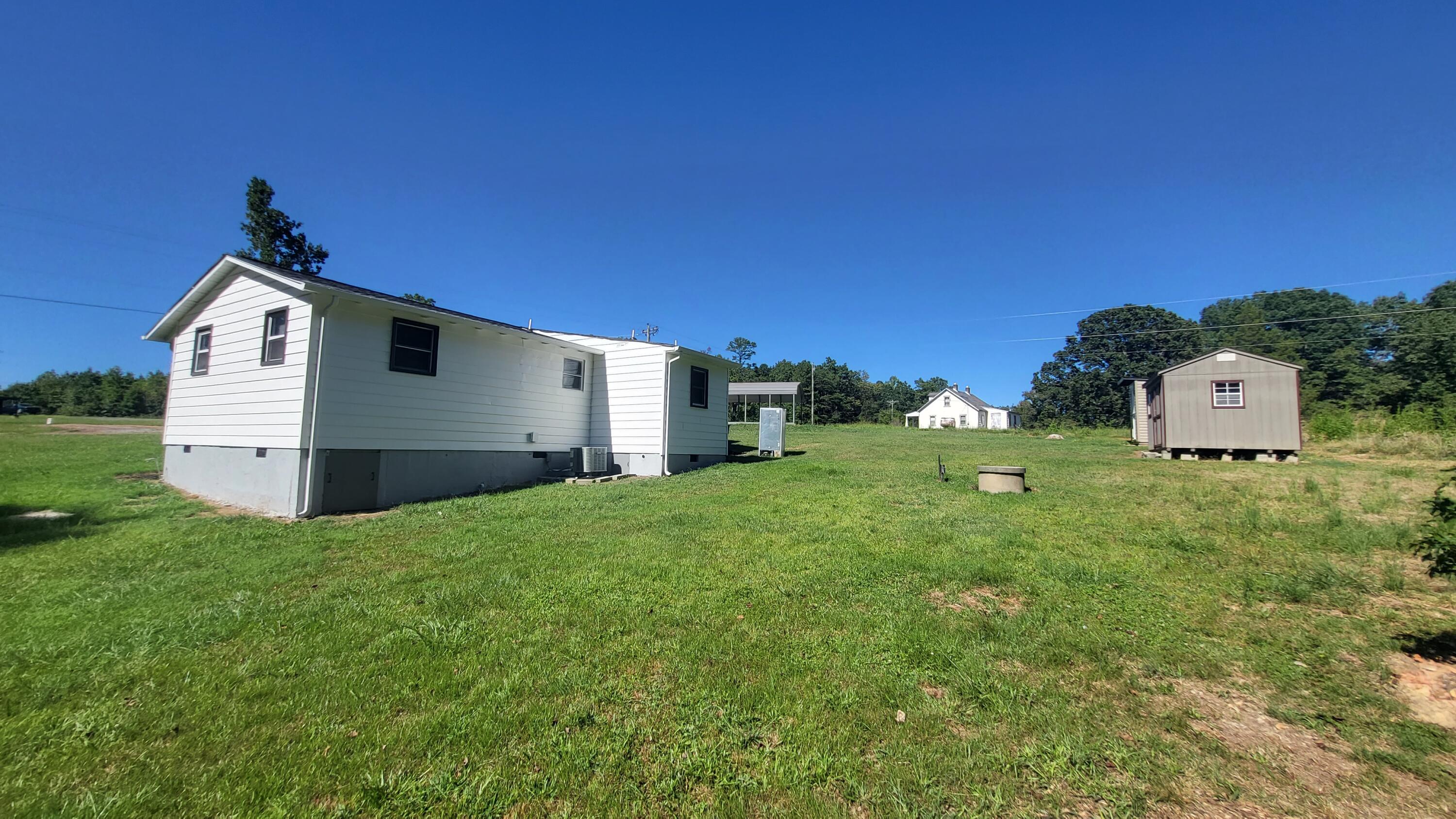 7588 Venable Road Kents Store, VA 23084 - Photo 37 of 38 a front view of a house with a yard