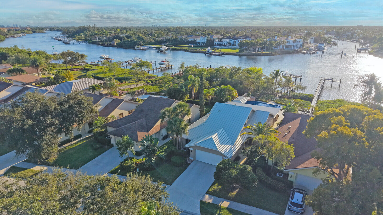 352 River Edge Road Jupiter, FL 33477 - Photo 17 of 50 an aerial view of a houses with outdoor space