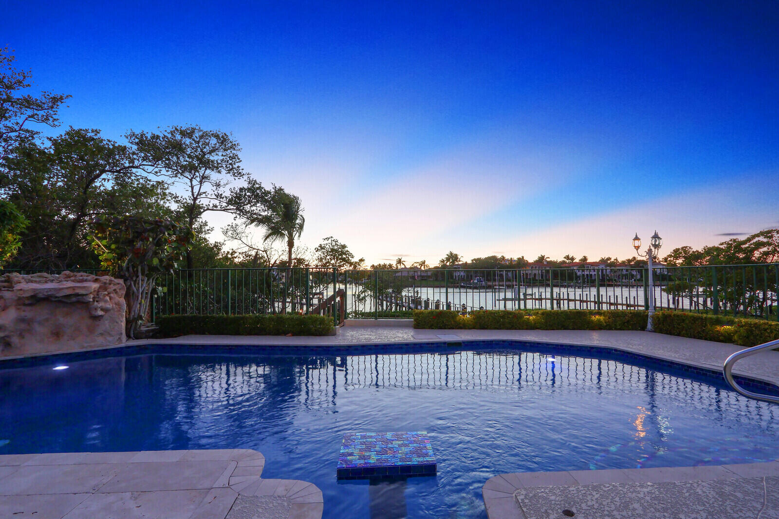 352 River Edge Road Jupiter, FL 33477 - Photo 21 of 50 a view of a lake with couches