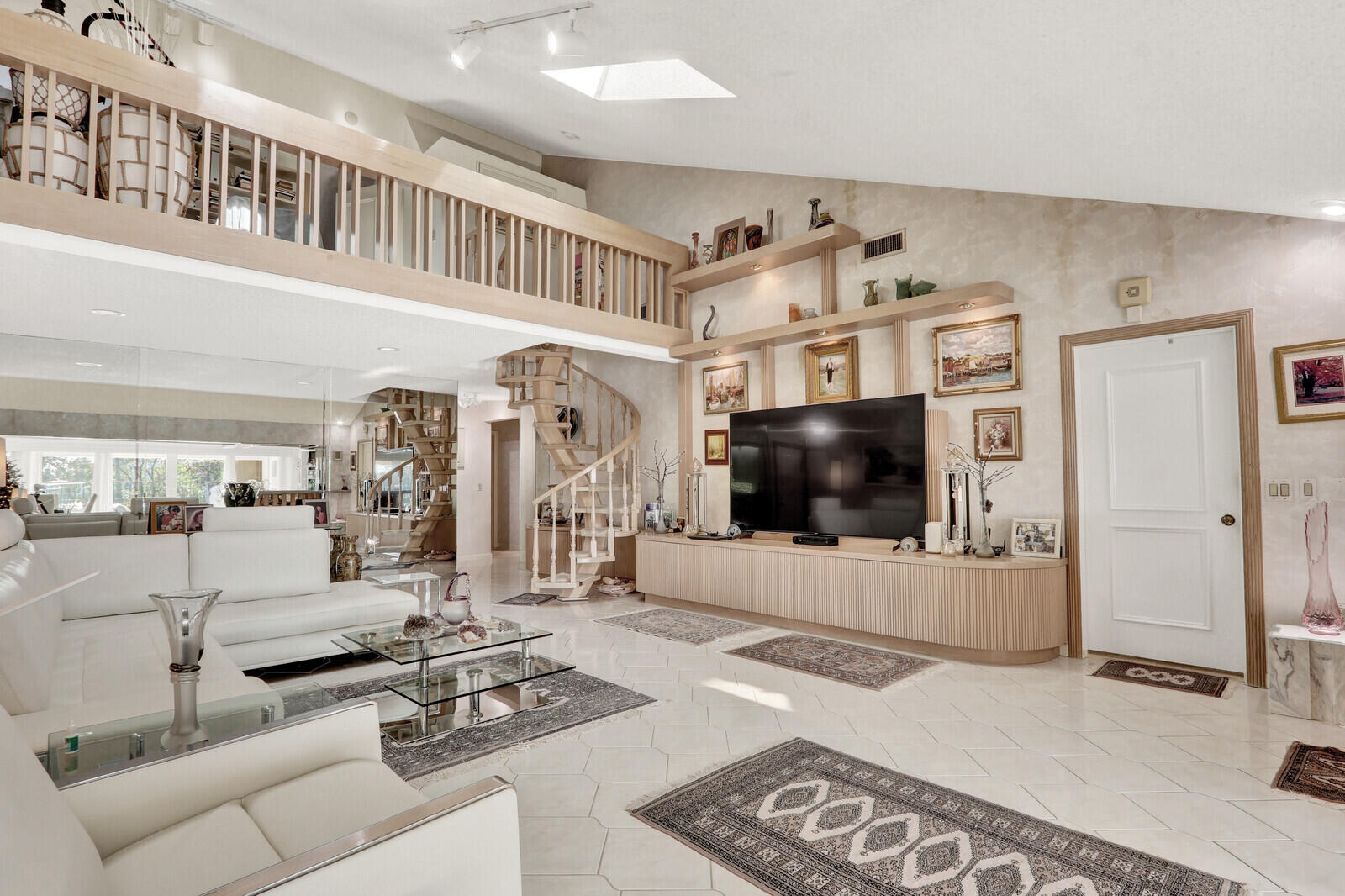 352 River Edge Road Jupiter, FL 33477 - Photo 28 of 50 a living room with furniture and a flat screen tv