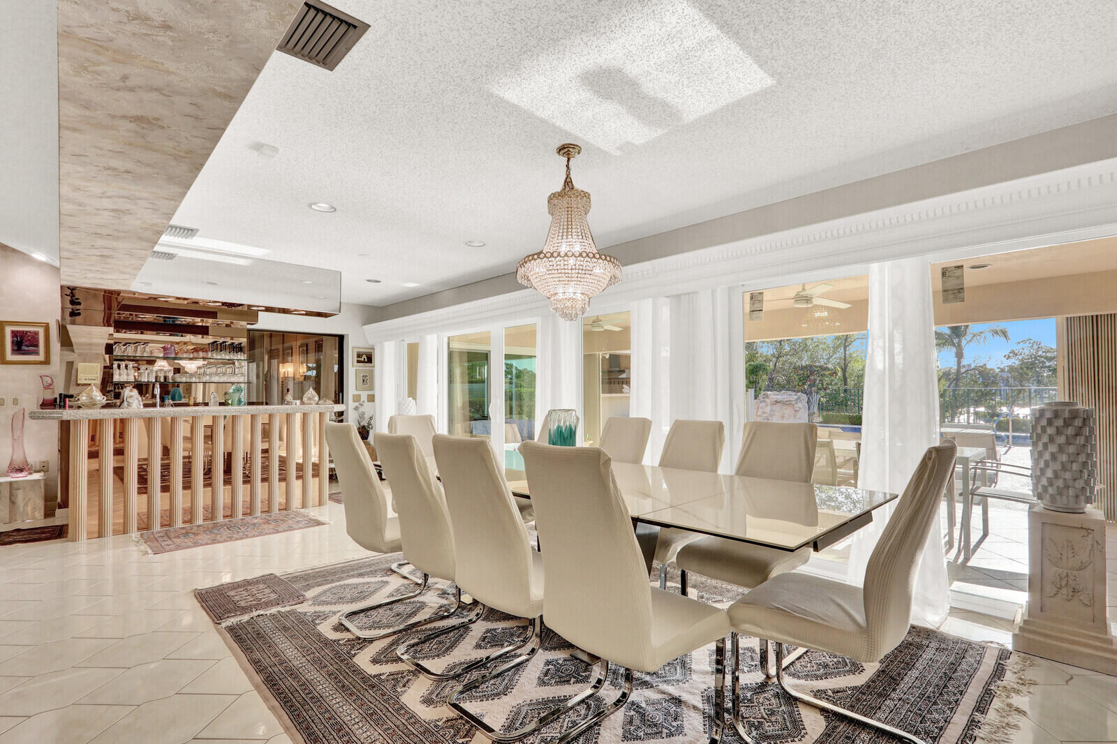 352 River Edge Road Jupiter, FL 33477 - Photo 31 of 50 a view of a dining room with furniture window and wooden floor