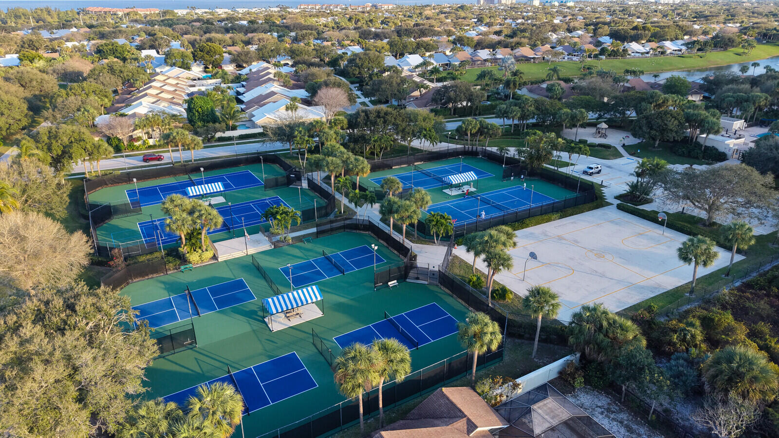 352 River Edge Road Jupiter, FL 33477 - Photo 50 of 50 an aerial view of a houses and a garden