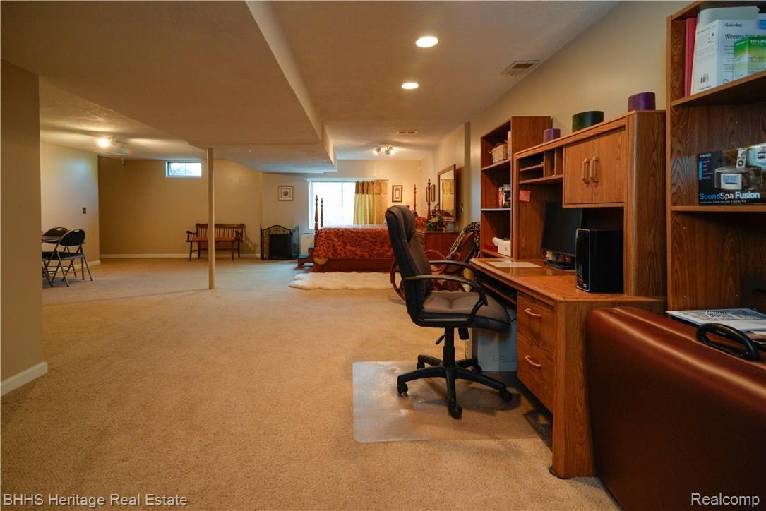 10100 Chase Lake Road Fowlerville, MI 48836 - Photo 31 of 41 Finished LL w Recessed Lights