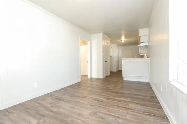 a view of a kitchen with a sink and dishwasher