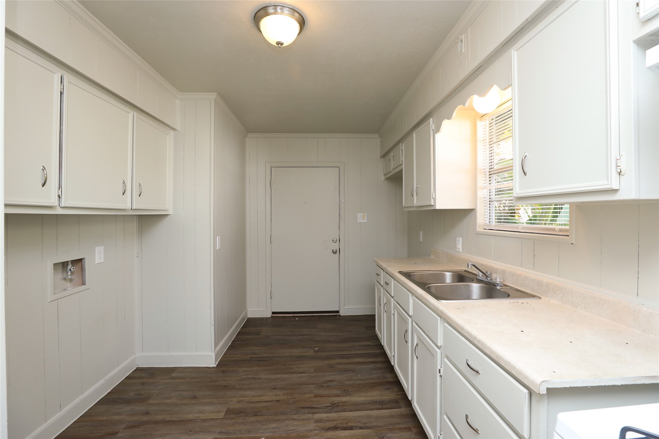 3606 Live Oak Street Houston, TX 77004 - Photo 7 of 15 a kitchen with a sink a window and cabinets