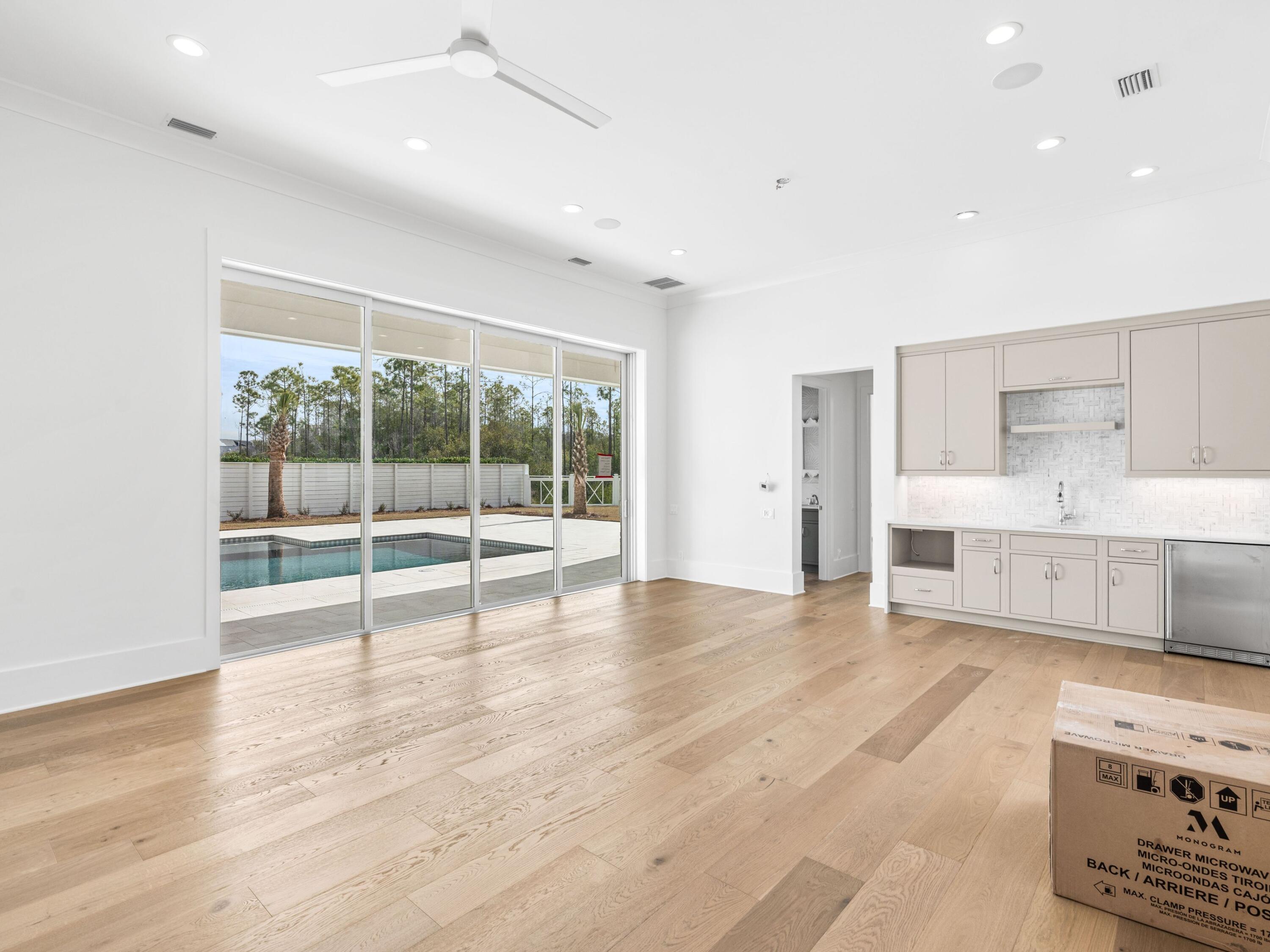 303 Golfridge Drive Watersound, FL 32461 - Photo 43 of 50 a view of an empty room with a window
