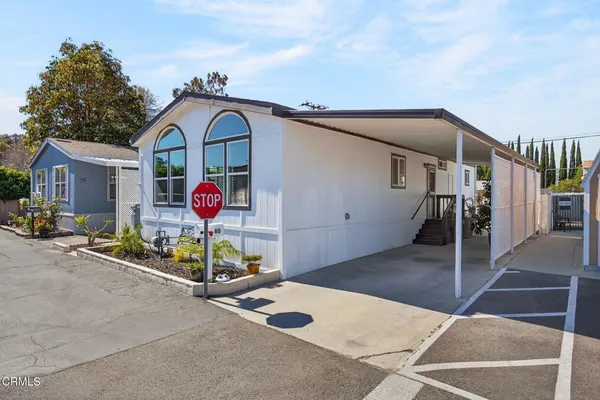 a front view of a house with entertaining space