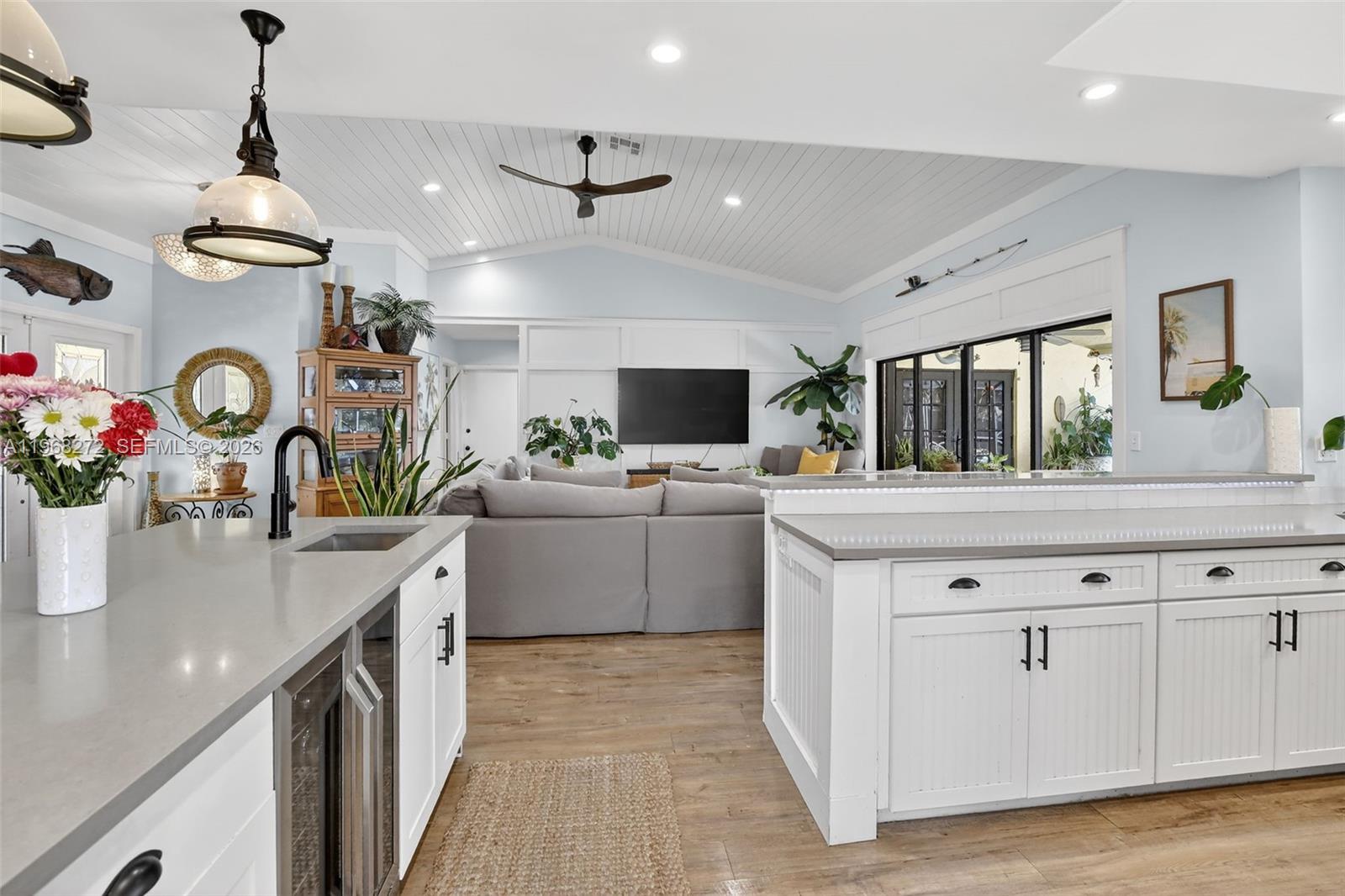 8740 Southwest 56th Place Cooper City, FL 33328 - Photo 12 of 54 a kitchen with a sink and a stove top oven
