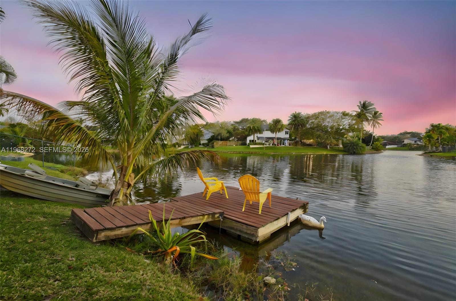 8740 Southwest 56th Place Cooper City, FL 33328 - Photo 25 of 54 a lake view with a garden