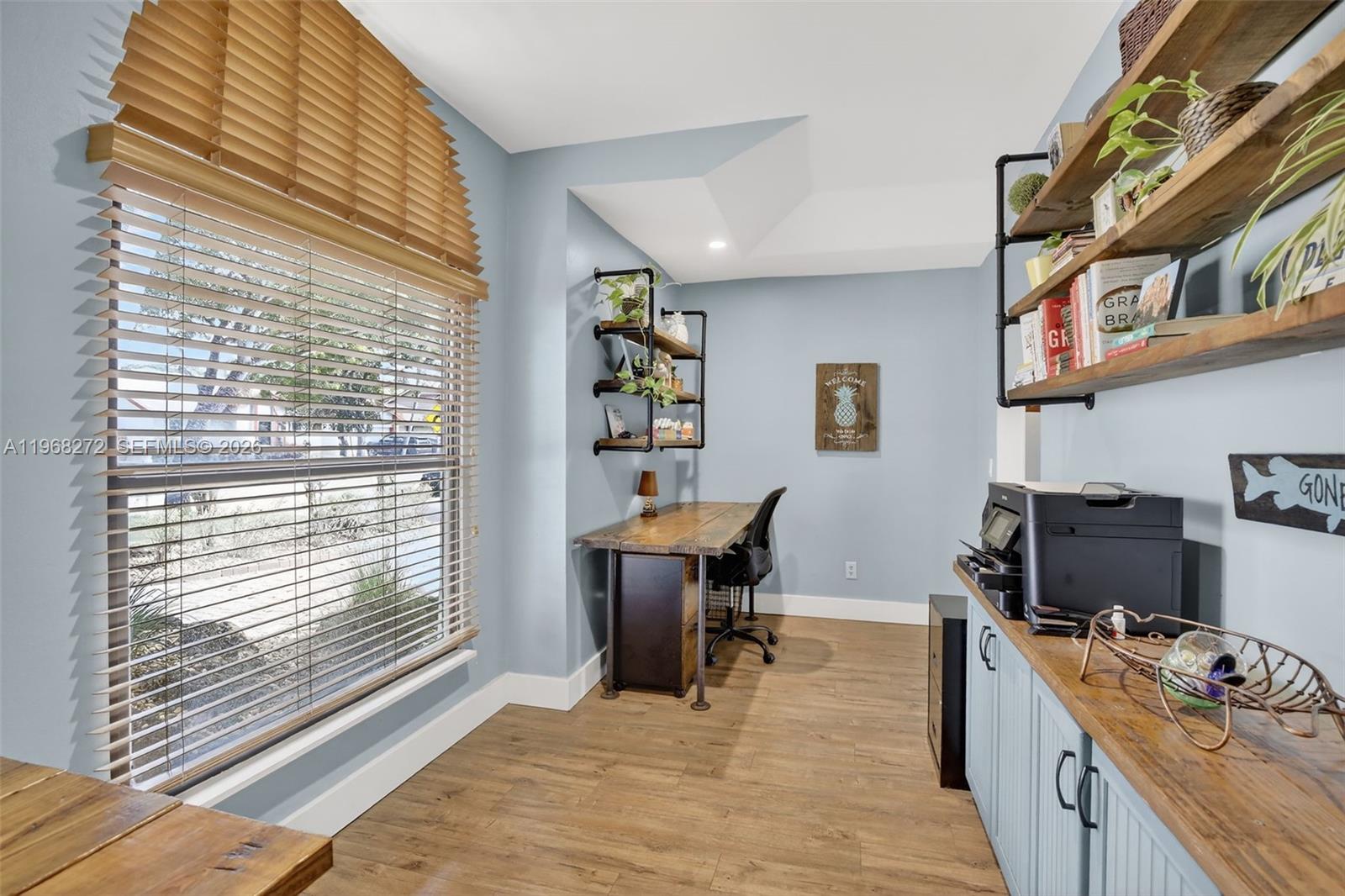 8740 Southwest 56th Place Cooper City, FL 33328 - Photo 32 of 54 a workspace with furniture and a window