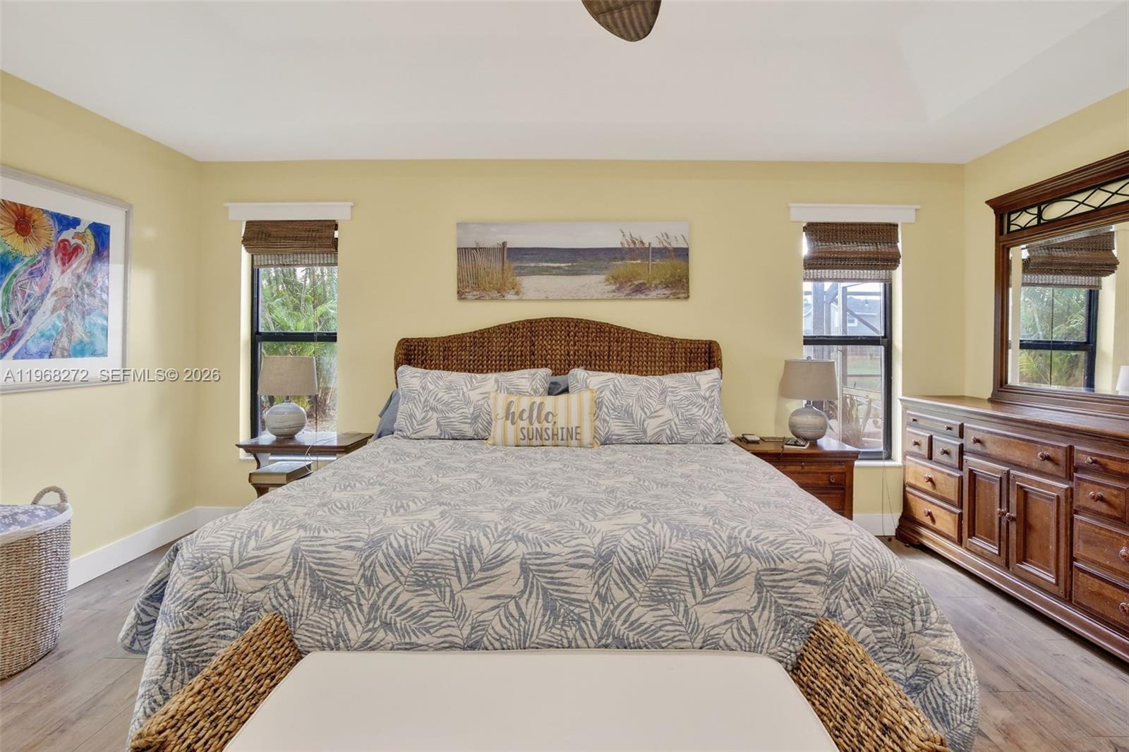 8740 Southwest 56th Place Cooper City, FL 33328 - Photo 33 of 54 a bedroom with a large bed and a dresser