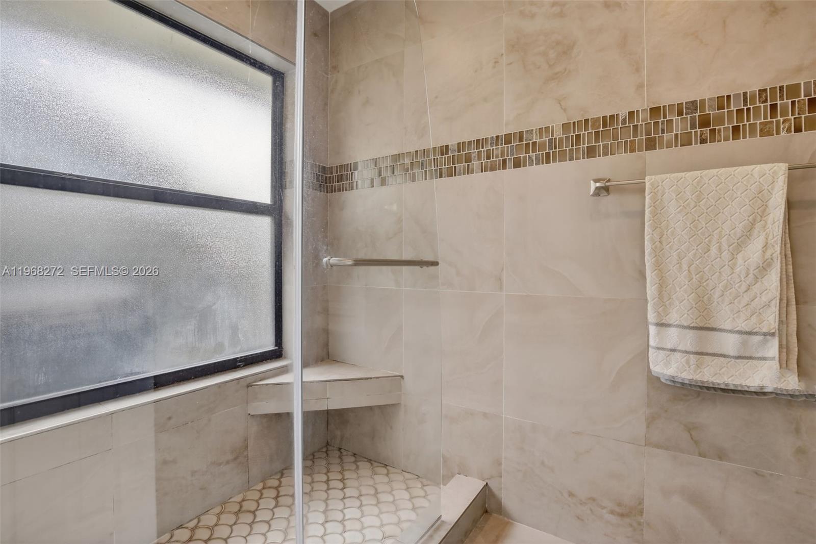 8740 Southwest 56th Place Cooper City, FL 33328 - Photo 39 of 54 a bathroom with a shower
