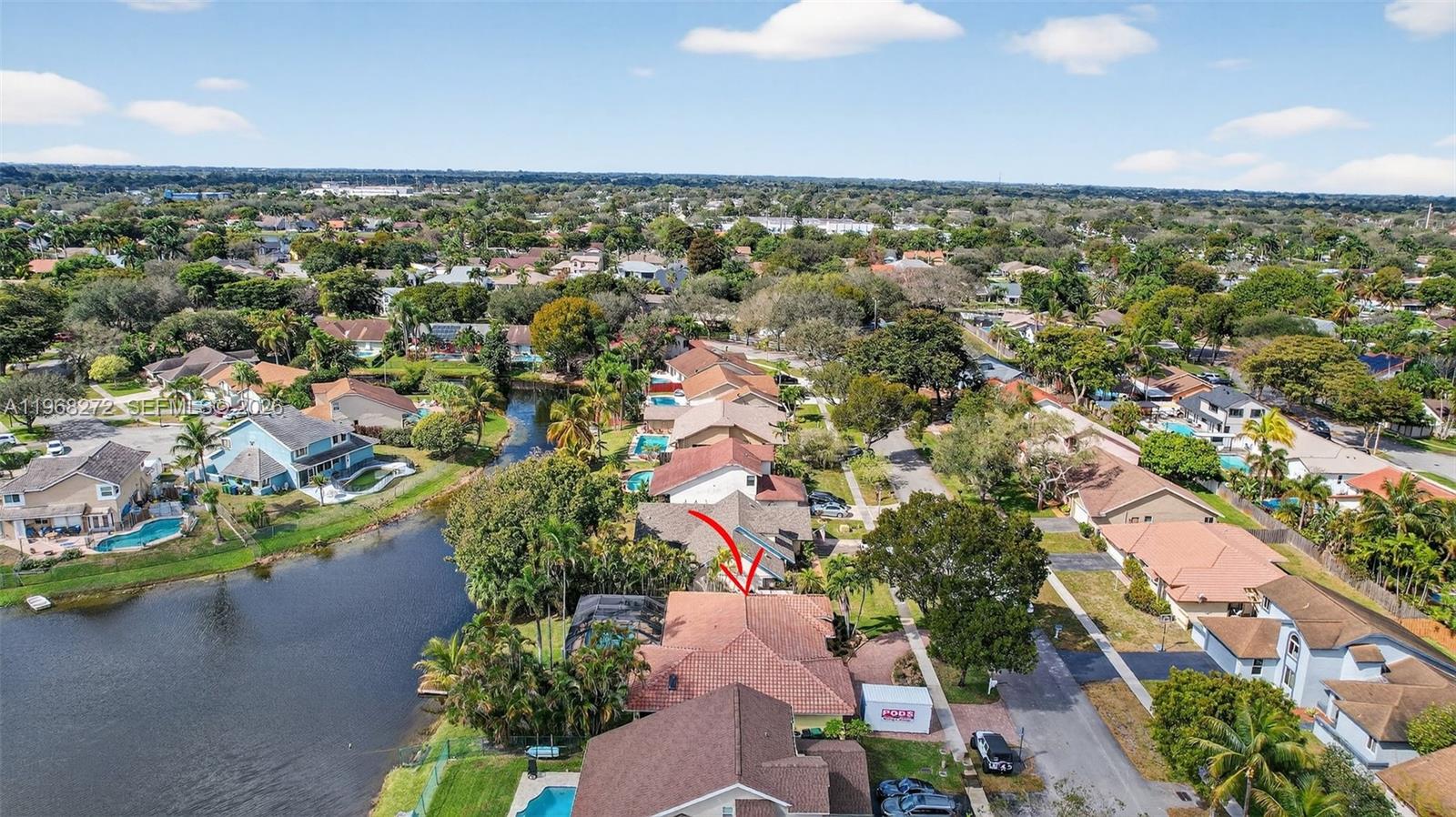 8740 Southwest 56th Place Cooper City, FL 33328 - Photo 47 of 54 an aerial view of a city with lots of residential buildings