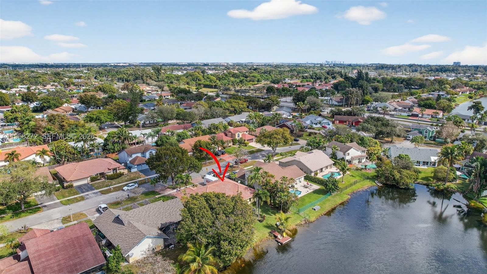 8740 Southwest 56th Place Cooper City, FL 33328 - Photo 50 of 54 an aerial view of a houses with a street