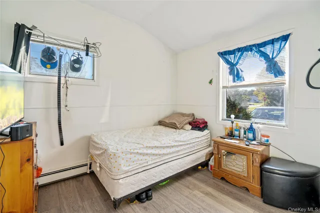 a room with a bed and a window