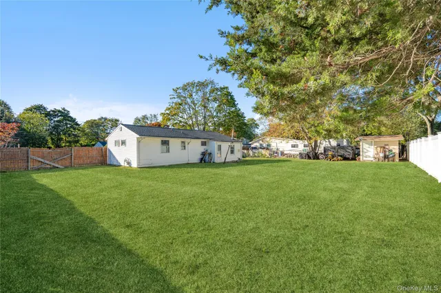 a view of a house with a big yard