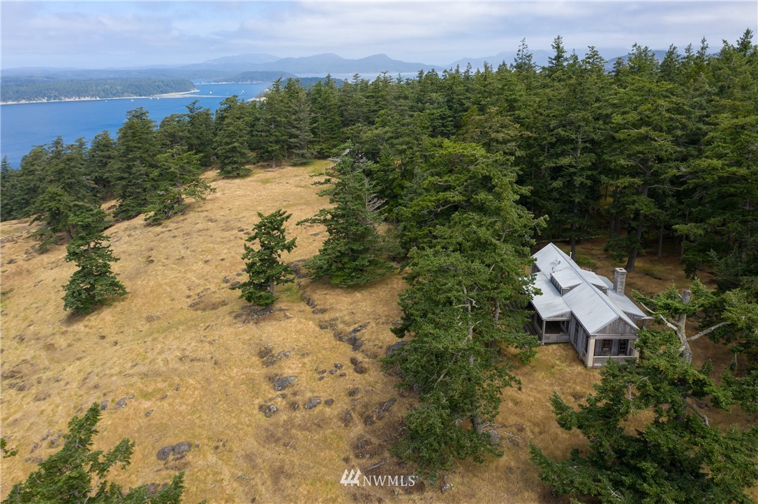 4-dh 4-dh 4-dh Decatur Street Northwest Anacortes, WA 98221 - Photo 19 of 24 a aerial view of a house with a yard and lake view