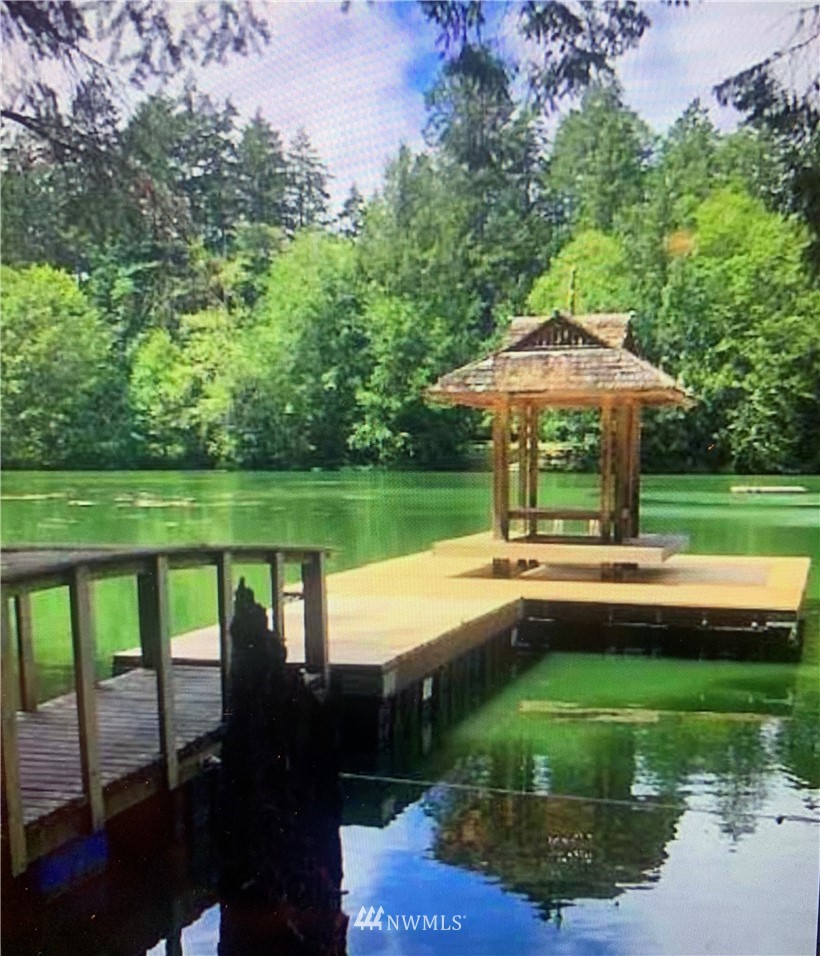 4-dh 4-dh 4-dh Decatur Street Northwest Anacortes, WA 98221 - Photo 23 of 24 a view of a swimming pool and lounge chairs in back yard