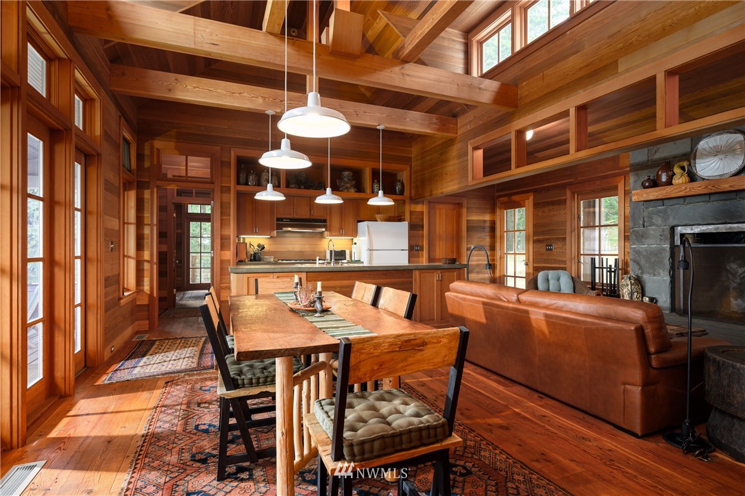 4-dh 4-dh 4-dh Decatur Street Northwest Anacortes, WA 98221 - Photo 6 of 24 a view of a dining room with furniture and chandelier