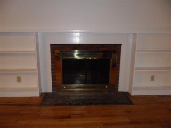 129 Red Acre Road Stow, MA 01775 - Photo 3 of 24 a living room with a fireplace